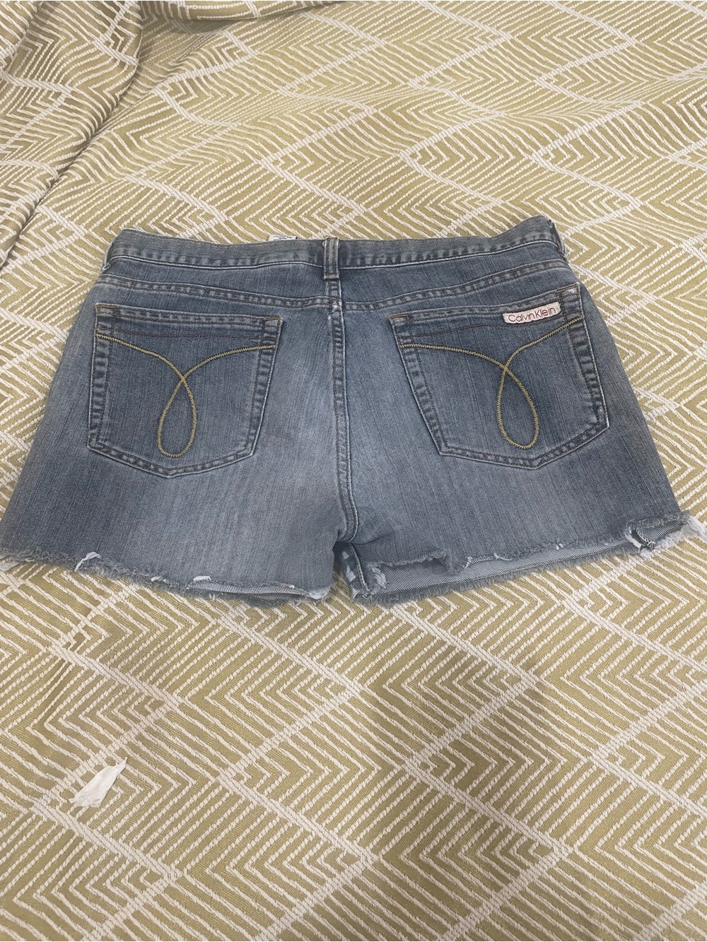 Calvin Klein Faded Blue Denim Cutoff Shorts